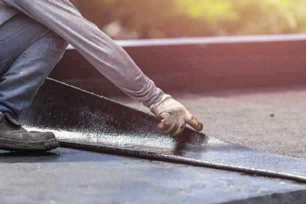 Professional Basement Waterproofing technician working in Utica, OH